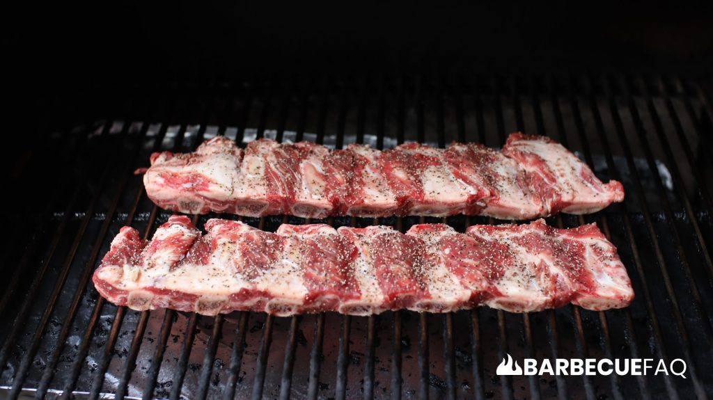 beef back ribs in the middle of a pellet grill