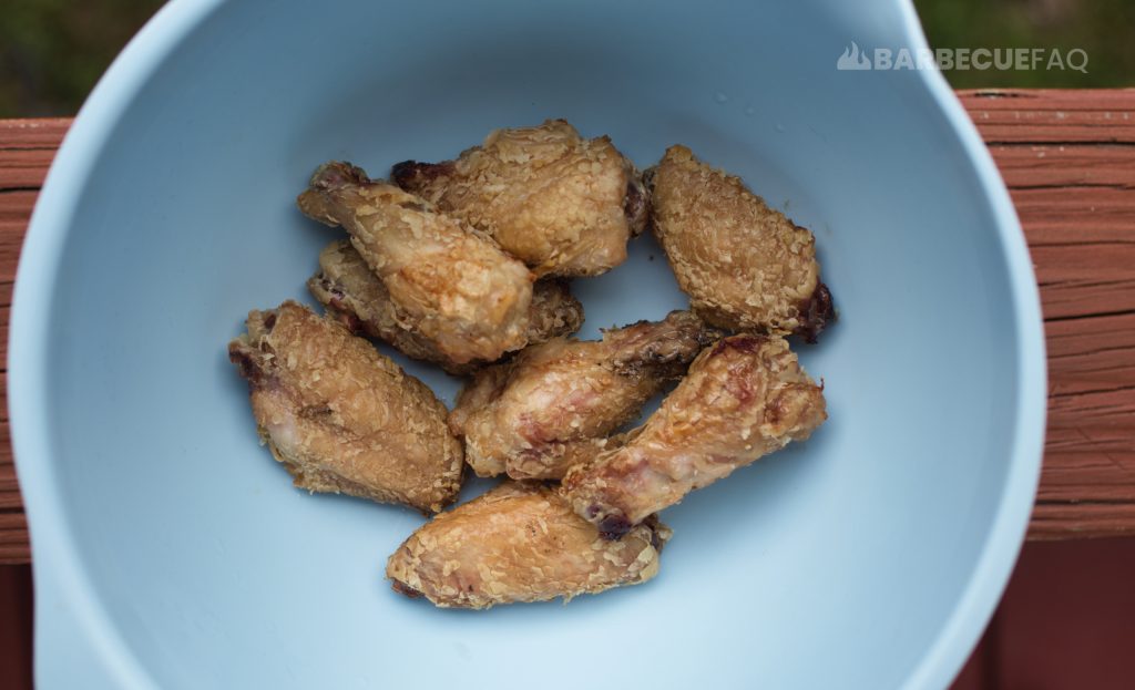 wings in bowl that were breaded with cornstarch