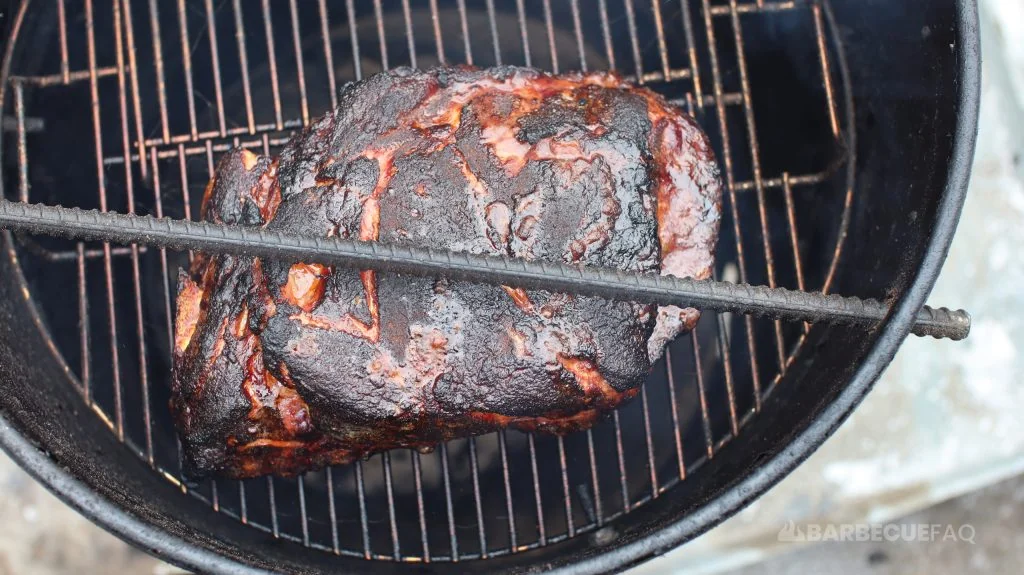 pork butt fat side down in pit barrel cooker