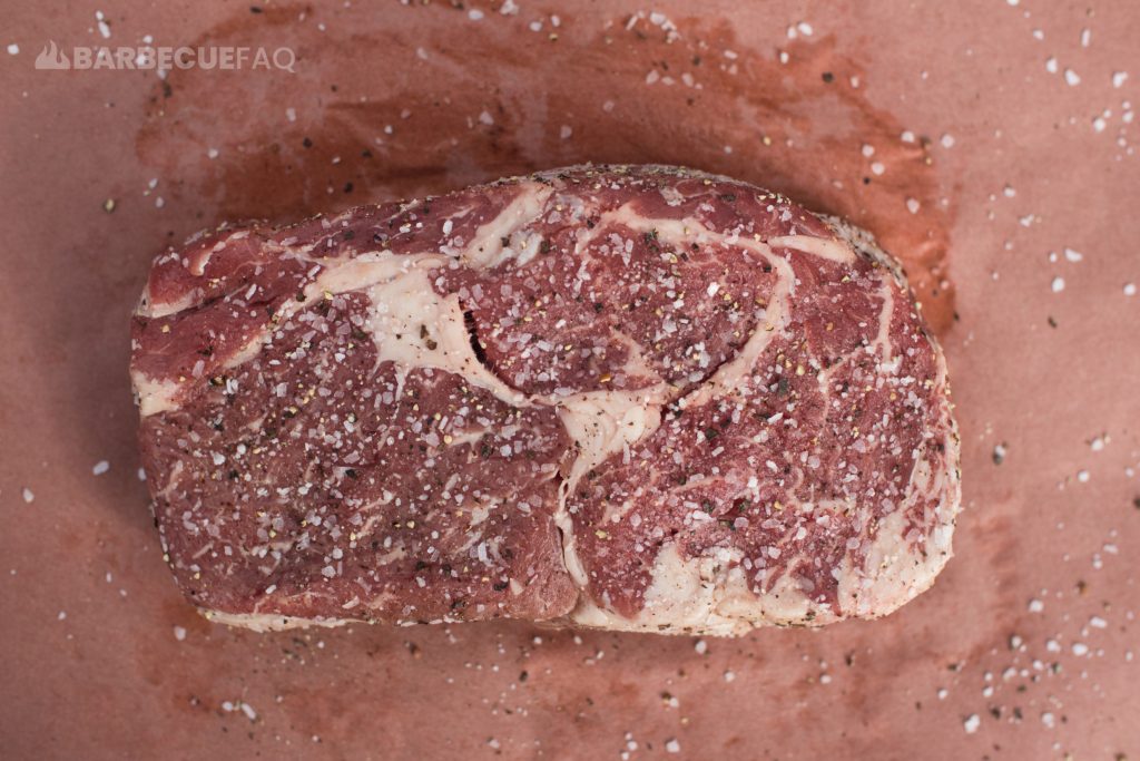 season steak liberally with kosher salt and pepper