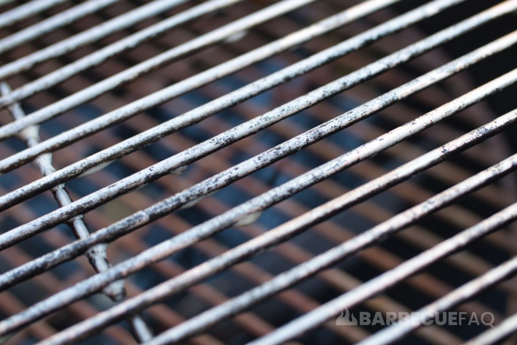 carbonized debris on grill grates