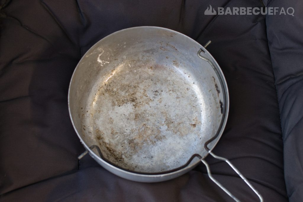 interior of charcoal basket cleaned