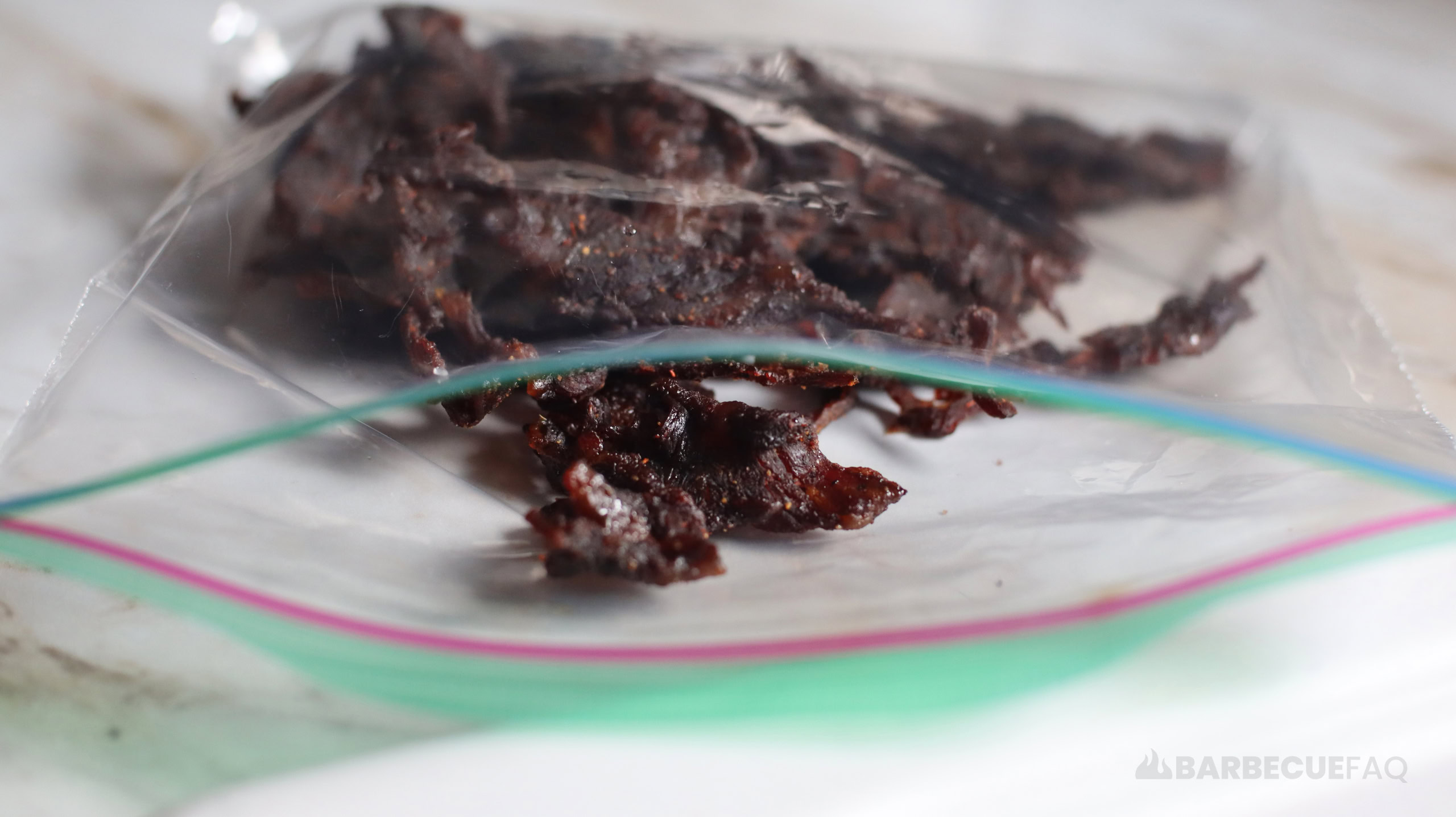 aerating beef jerky in a storage bag