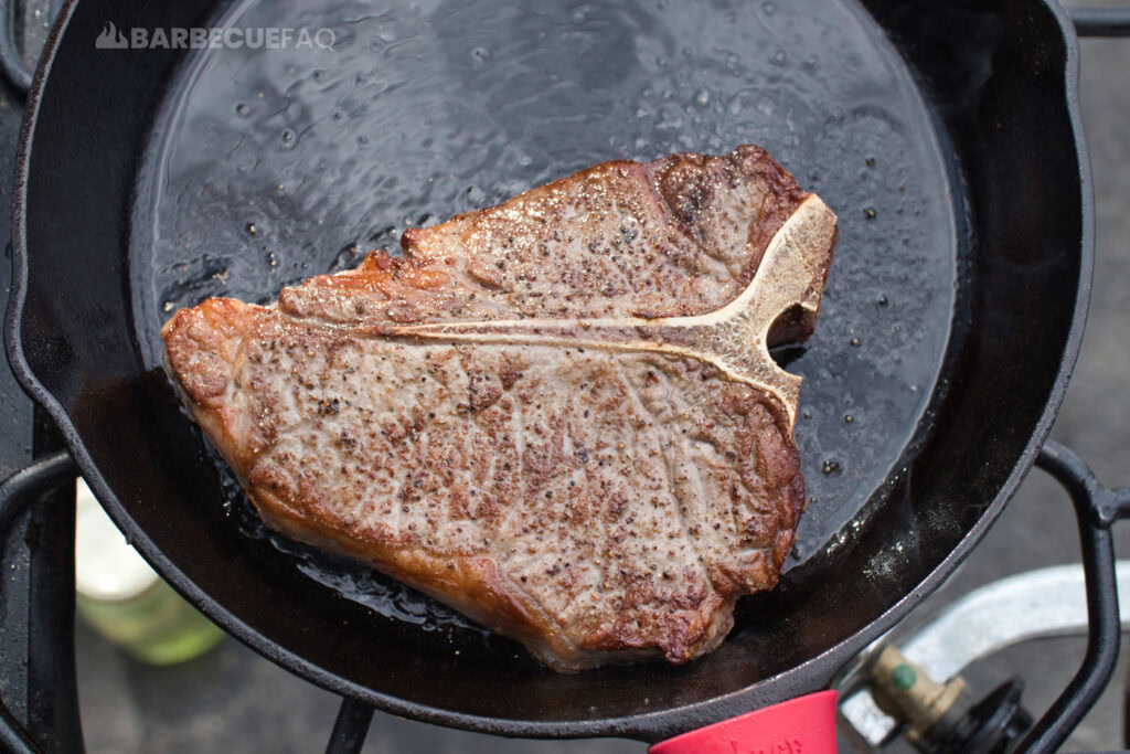 flip steak to different parts of the skillet