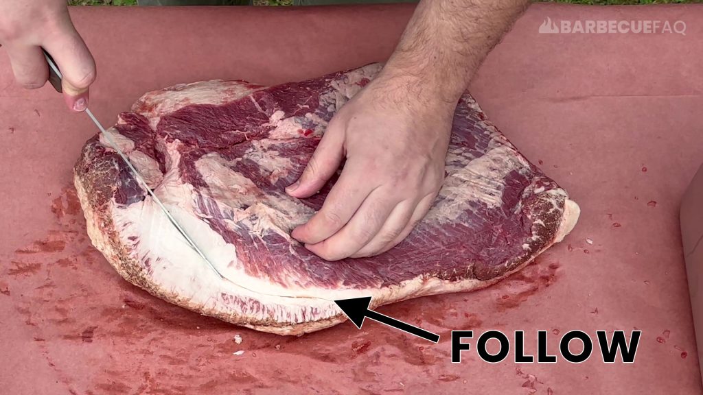 follow the fat seam that separates the brisket muscles