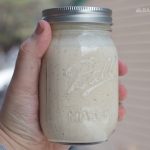 homemade Alabama White sauce in a small mason jar