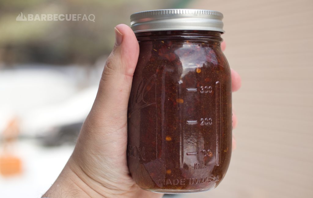 homemade East Carolina vinegar sauce in a small mason jar