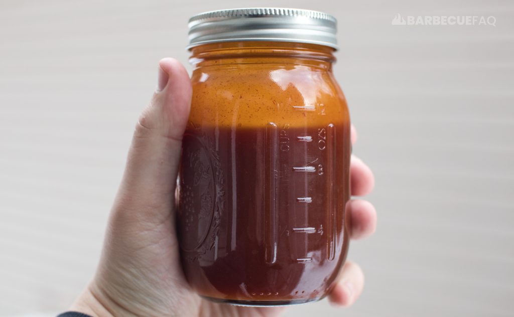 homemade Kansas City-style bbq sauce in a small mason jar