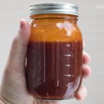 homemade Kansas City-style bbq sauce in a small mason jar