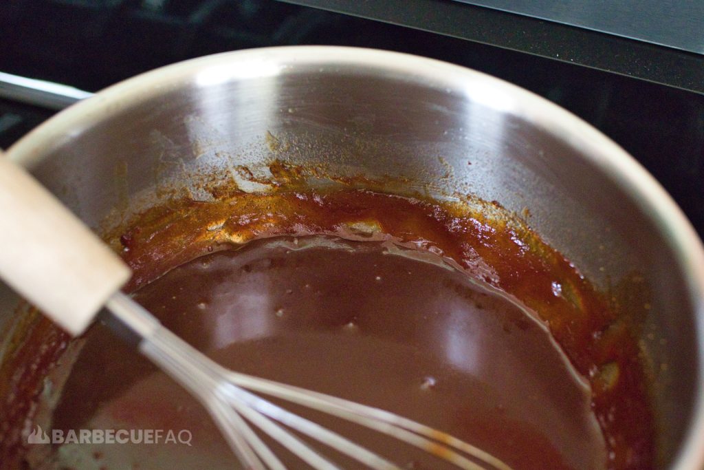 kansas city sauce reduced by roughly half in medium sauce pan