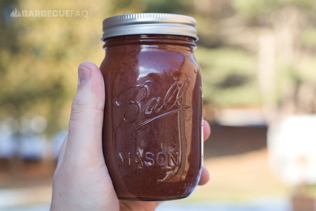 Memphis barbecue sauce in a small mason jar