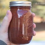 Texas-style bbq sauce in a small mason jar