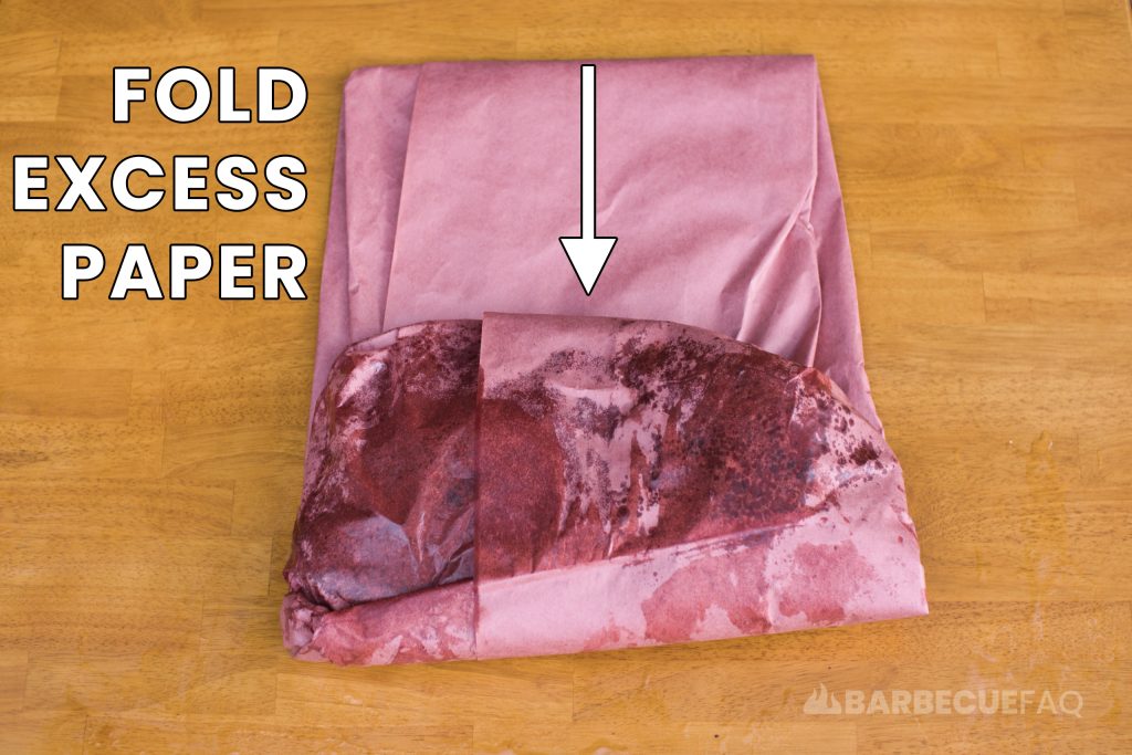 folding excess butcher paper and then tucking it under the wrap