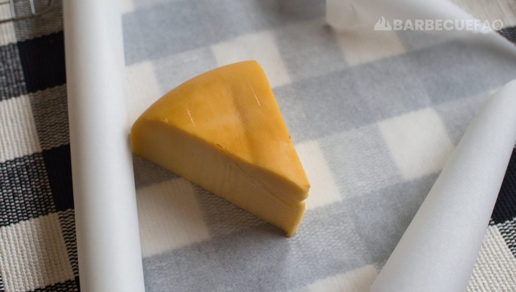 wrap cold smoked gouda cheese in parchment paper