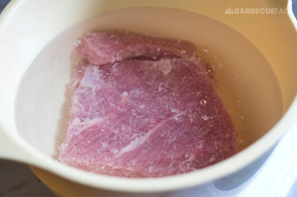 soaking brined corned beef in water