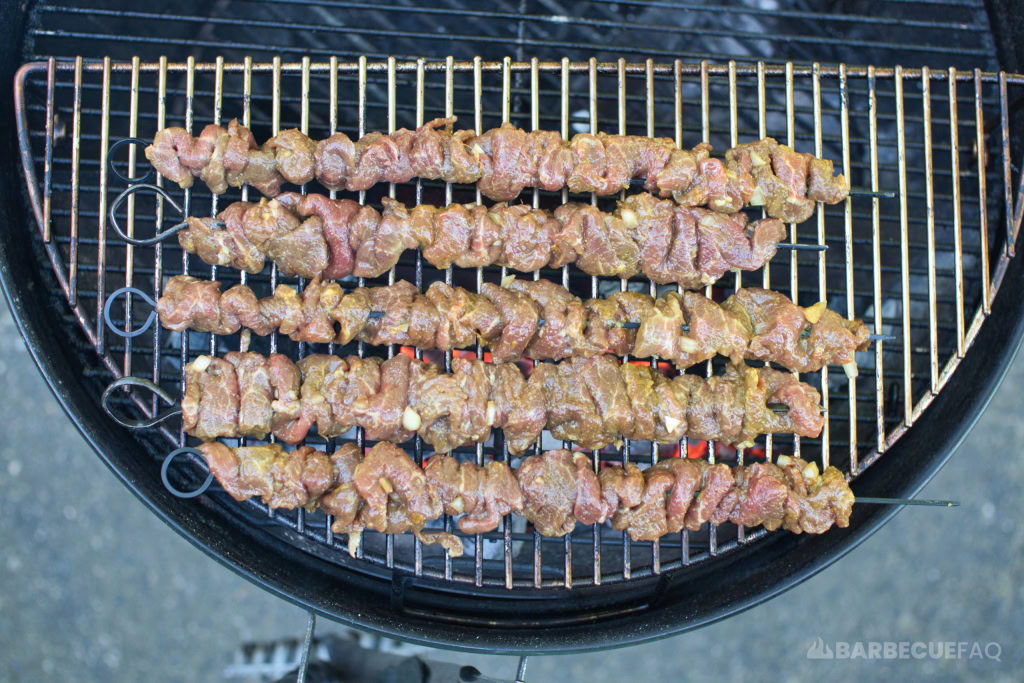 grilling beef satay