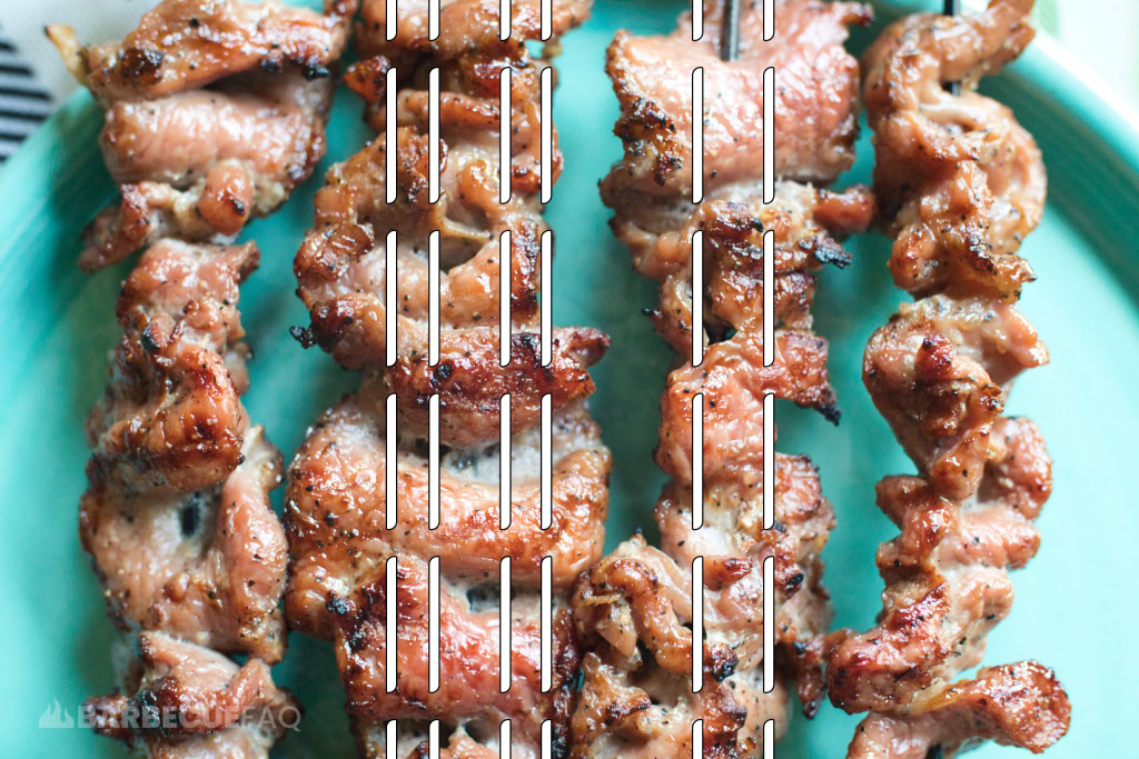 slicing pork off skewer