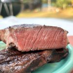 reverse seared ribeye steak with perfect medium-rare center