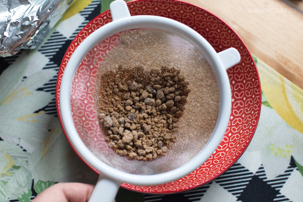 filtered hardened dark brown sugar after going through a mesh sieve