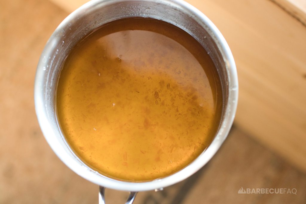 apricot simple syrup showing pulp