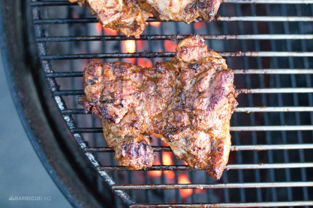 burrito chicken thighs being grilled