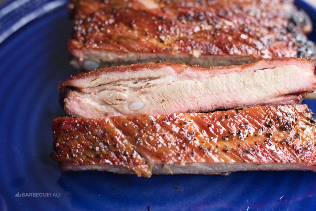 direct heat bbq spare ribs sliced between the bones