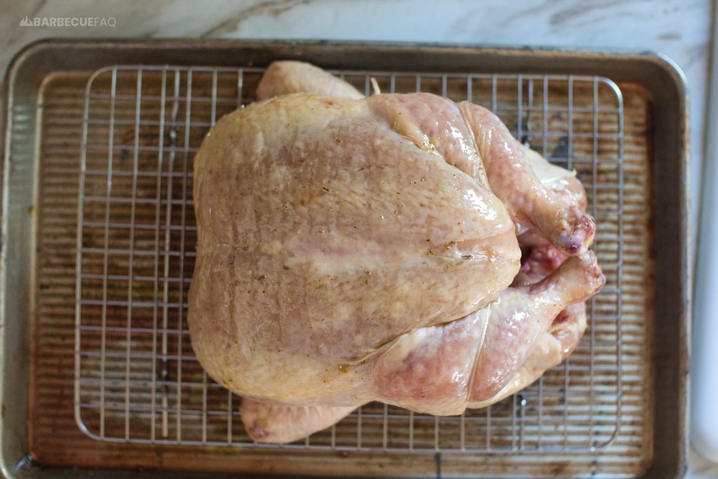 whole chicken dry brined, air dried, and oil applied